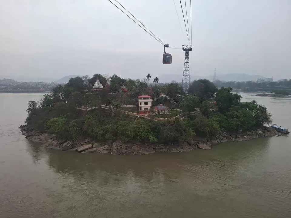 Umananda Island and its temple in the Brahmaputra seen from the Guwahati ropeway cabin